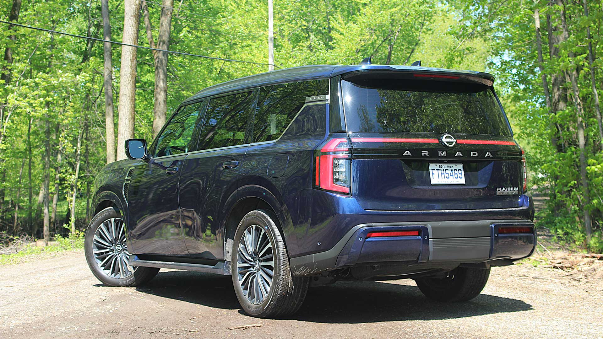 Rear three-quarter view of the 2025 Nissan Armada Platinum Reserve.