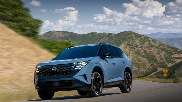 2027 Rogue Hybrid SR, front three-quarter view in the mountains