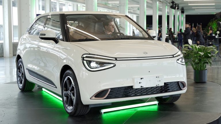 Small Dongfeng electric car on display at the brand's Canadian premiere in Montreal, July 2026