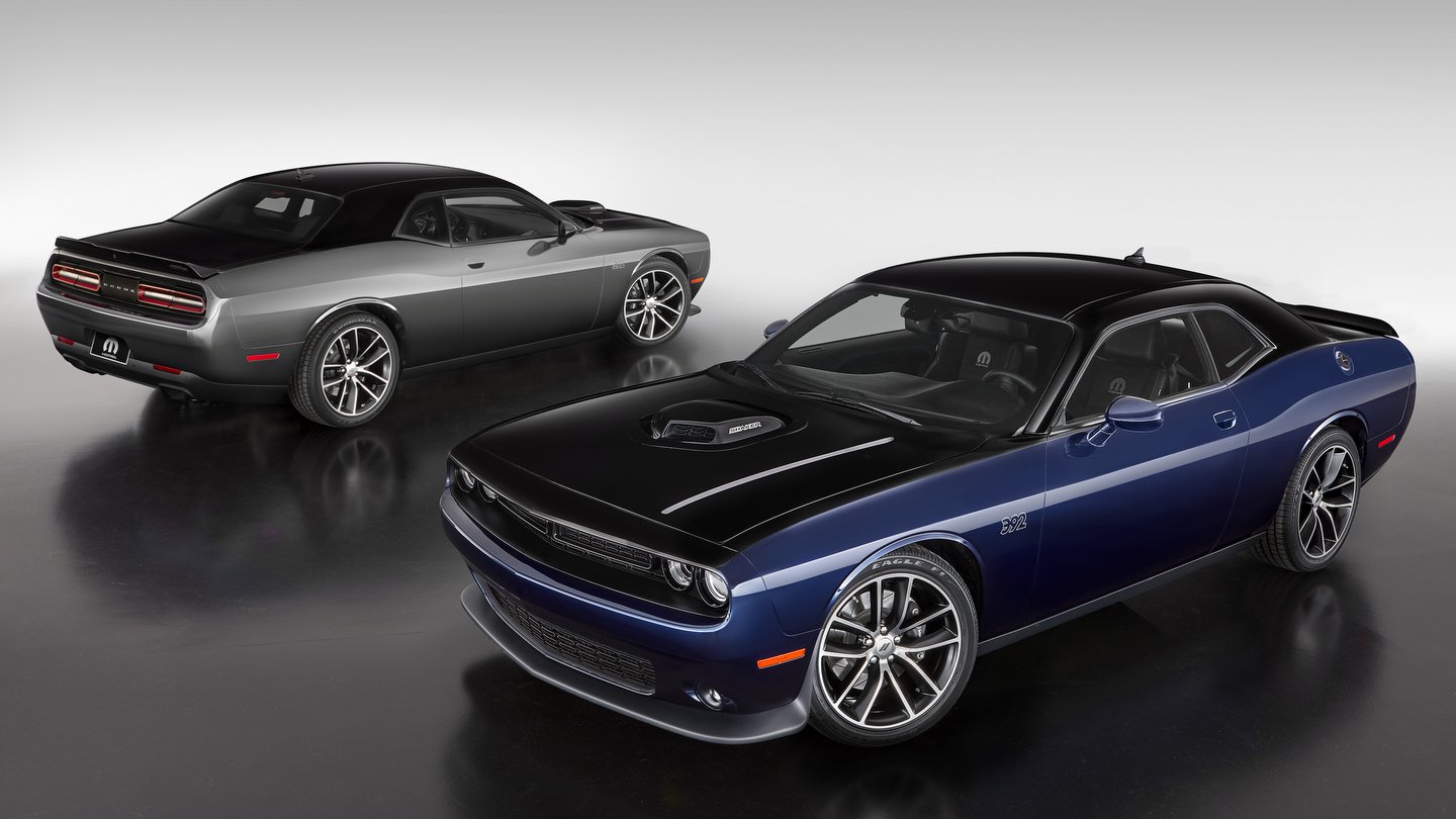 Two Mopar ‘17 Dodge Challengers, one in Pitch Black and Contusion Blue with a Shaker hood, one in Pitch Black and Billet Silver