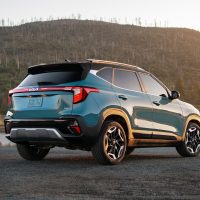Rear of a blue 2025 Kia Seltos seen from three-quarter